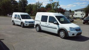 picture of two white vans