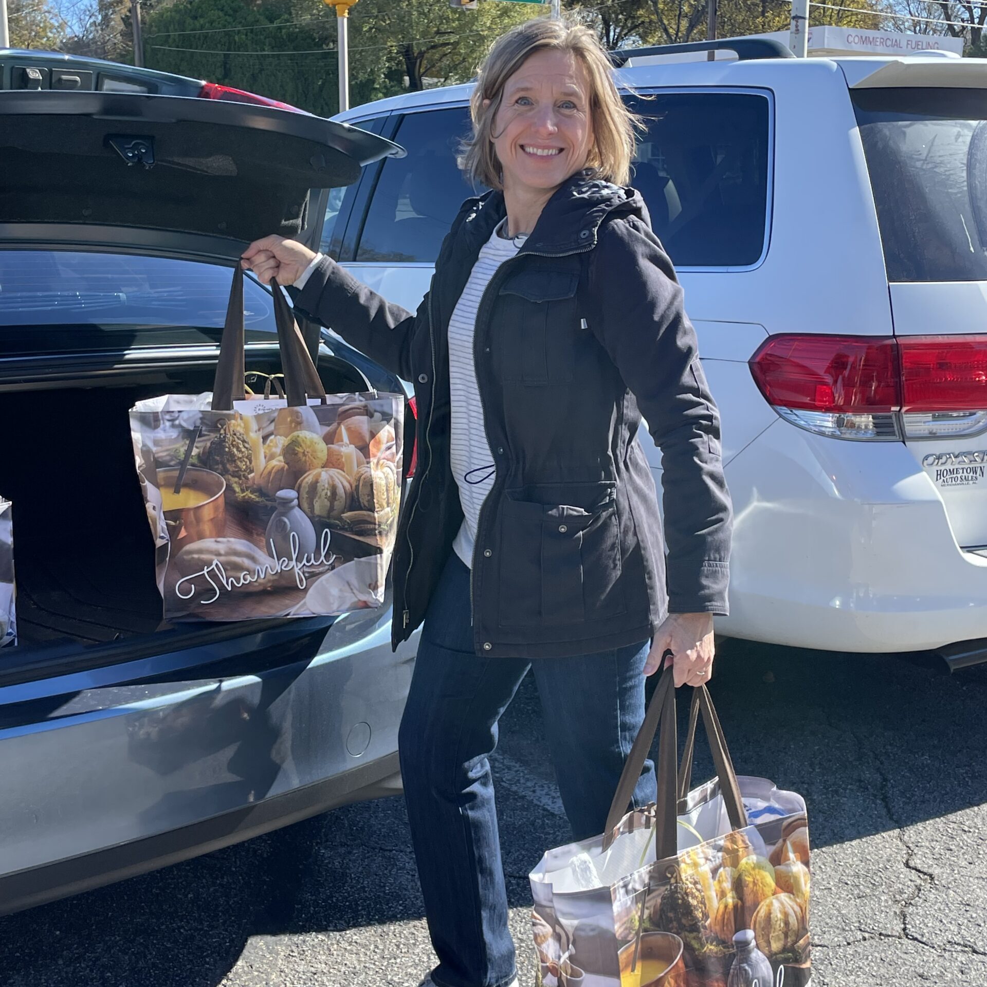 Volunteer with donation bags